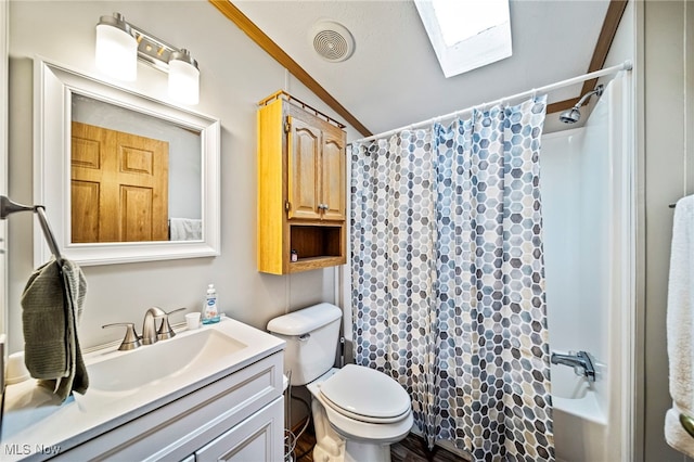 full bathroom with toilet, vanity, lofted ceiling with skylight, and shower / tub combo