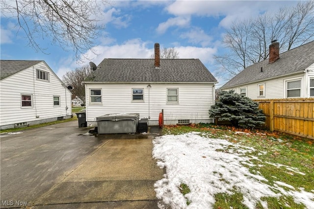 rear view of property with a patio area