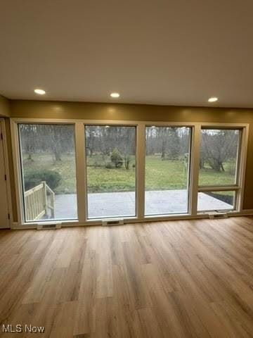 doorway to outside featuring hardwood / wood-style floors