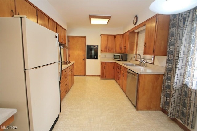 kitchen with sink and stainless steel appliances