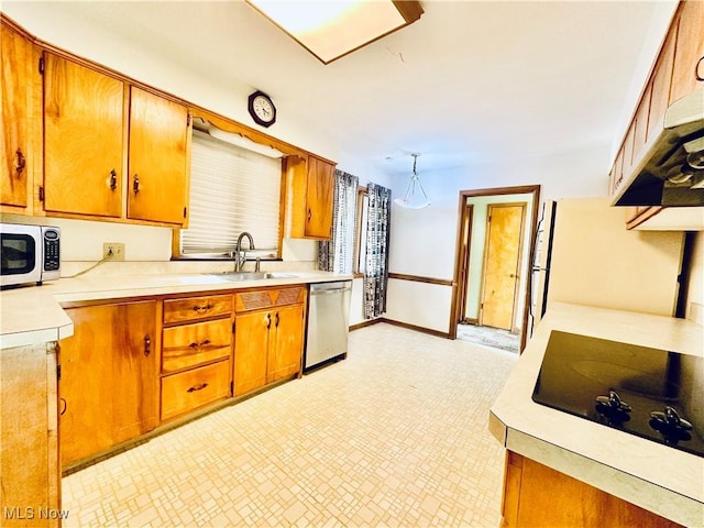 kitchen featuring appliances with stainless steel finishes and sink