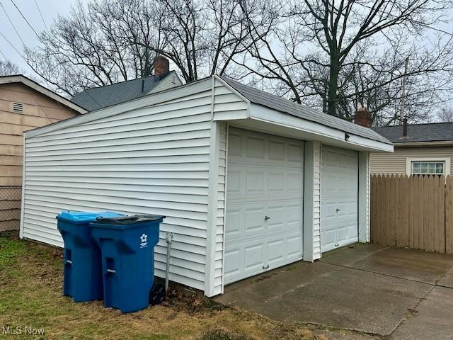 detached garage with fence