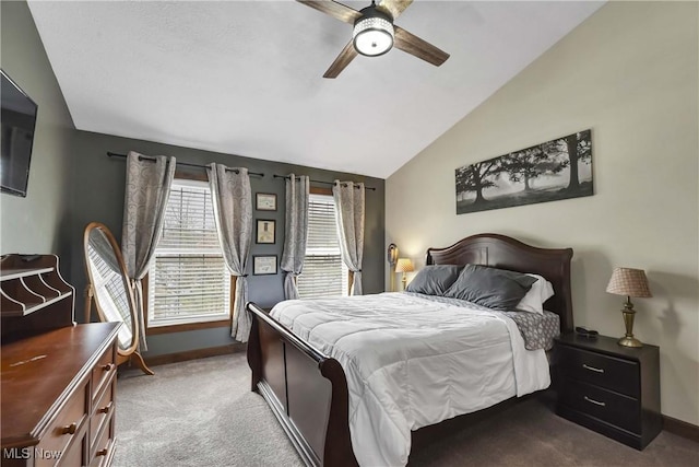 carpeted bedroom with lofted ceiling and ceiling fan