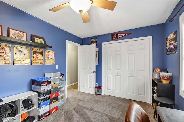 rec room with ceiling fan and carpet flooring