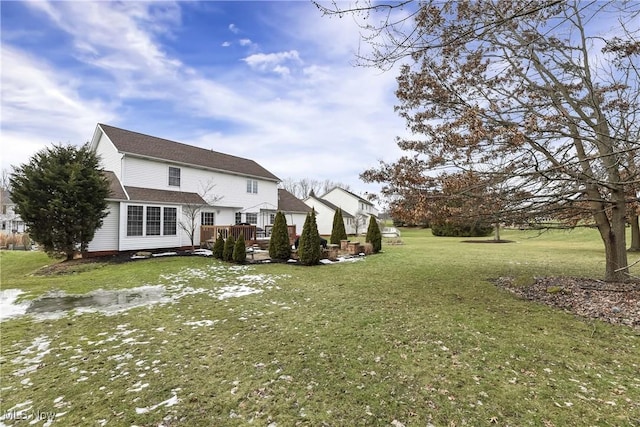 view of yard featuring a wooden deck