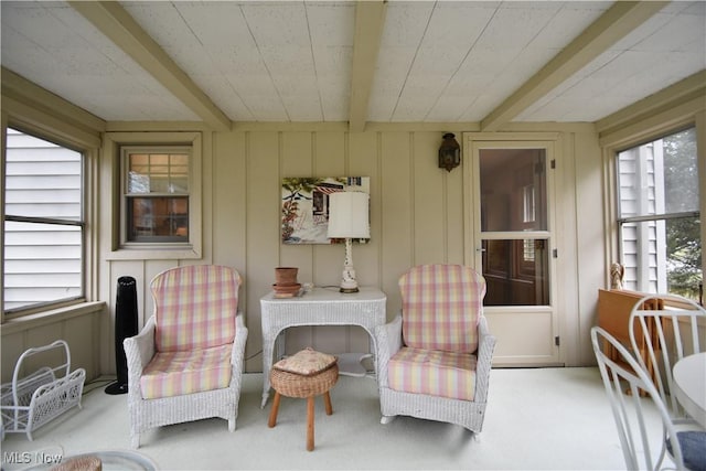 sunroom / solarium with plenty of natural light and beam ceiling