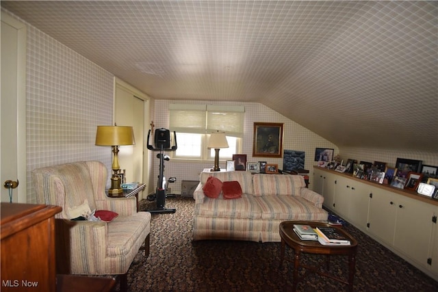 living room with lofted ceiling and carpet flooring