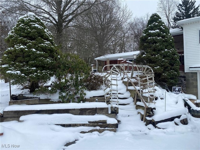 view of yard covered in snow