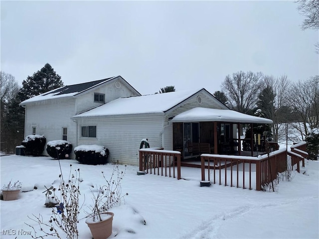 view of snow covered property