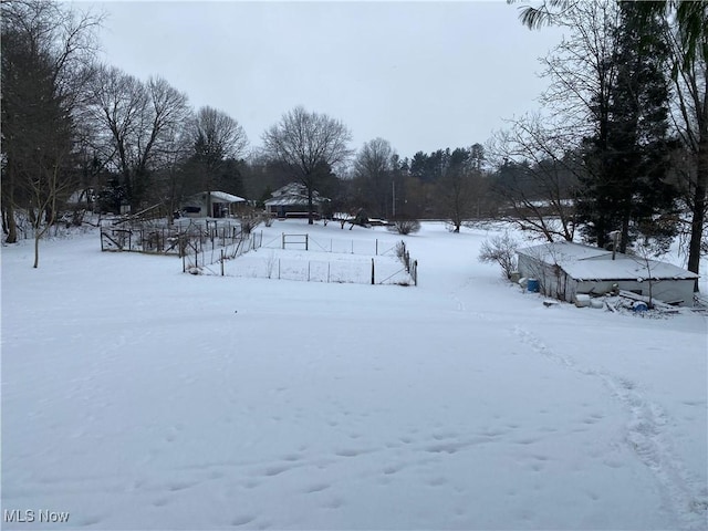 view of snowy yard