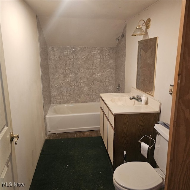 bathroom with shower / washtub combination, toilet, and vanity