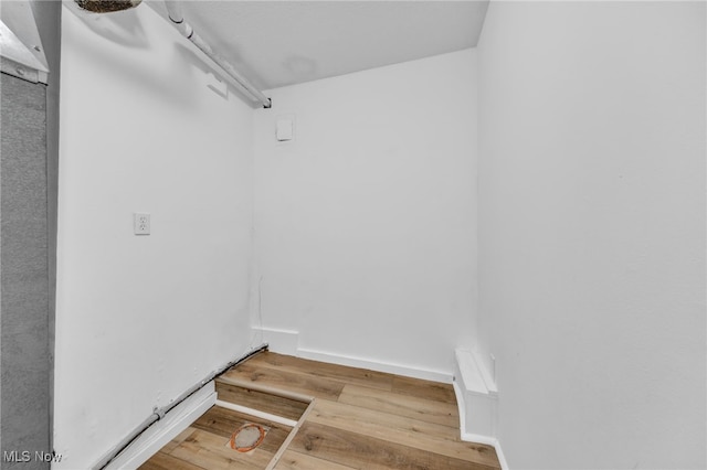 walk in closet featuring hardwood / wood-style floors