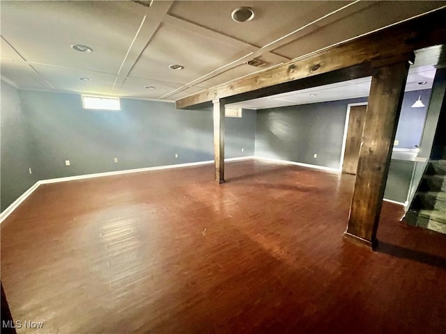 basement featuring hardwood / wood-style floors