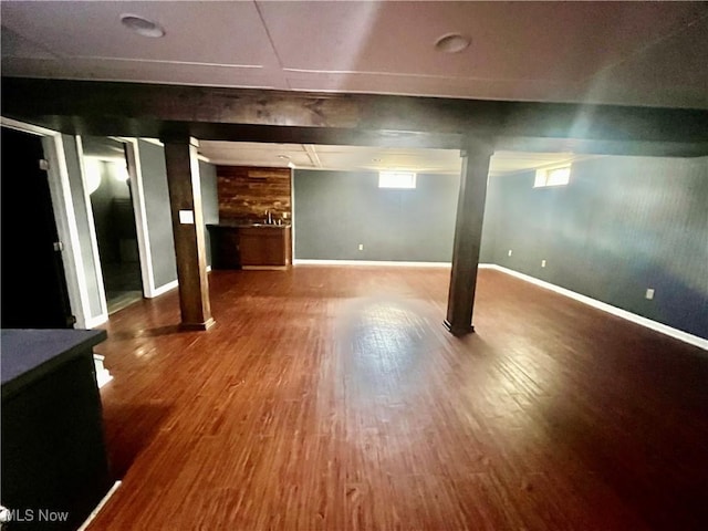 basement with wood-type flooring