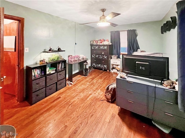 bedroom featuring ceiling fan and light wood-type flooring