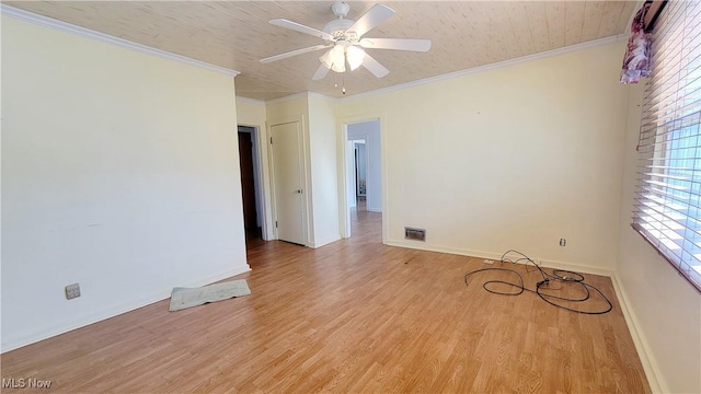 empty room featuring ornamental molding, ceiling fan, and light hardwood / wood-style floors