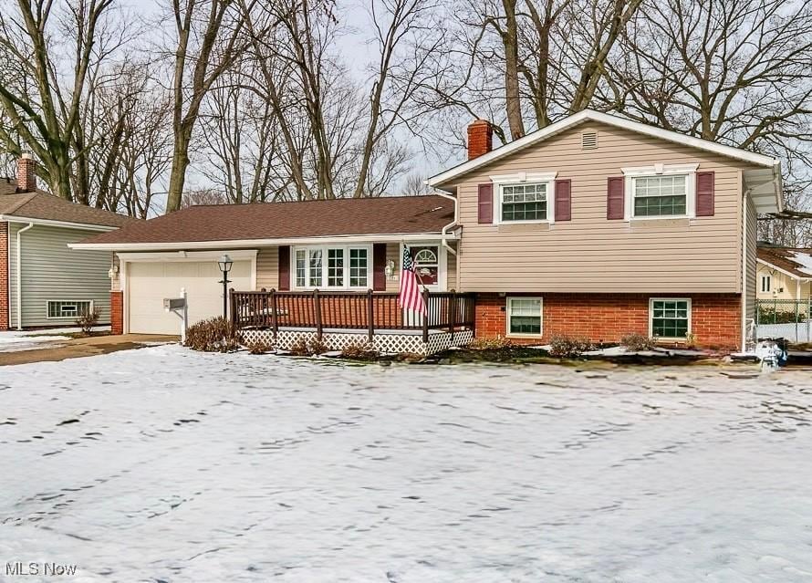 split level home with a garage