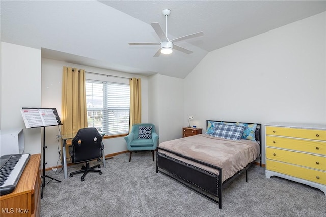 carpeted bedroom featuring lofted ceiling and ceiling fan