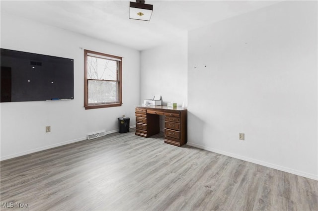 bedroom with light wood-type flooring