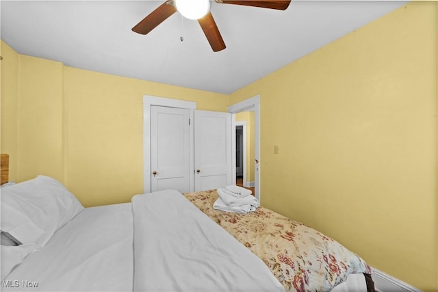 bedroom featuring ceiling fan