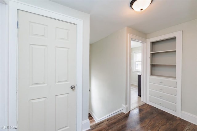 interior space with dark wood-type flooring