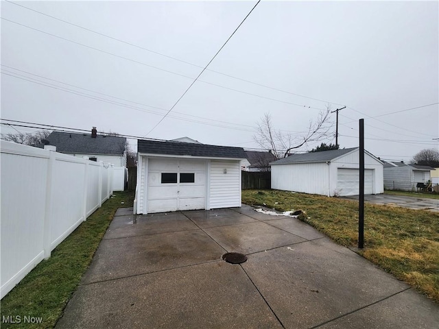 garage featuring a yard