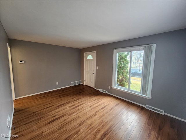 interior space with hardwood / wood-style flooring