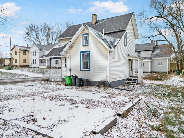 view of snow covered property