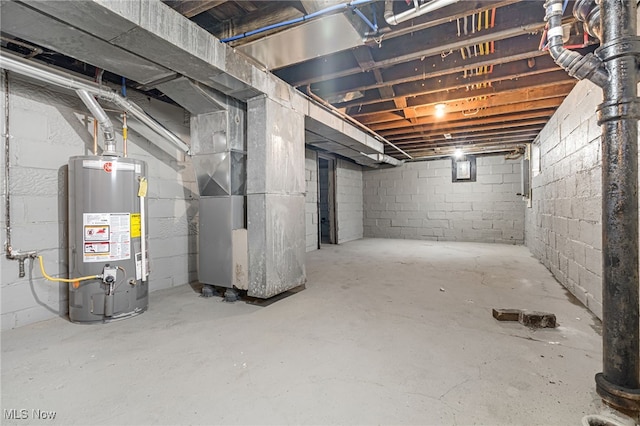 basement featuring gas water heater