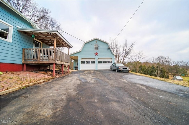 view of property exterior with a garage