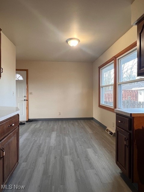 interior space with hardwood / wood-style floors