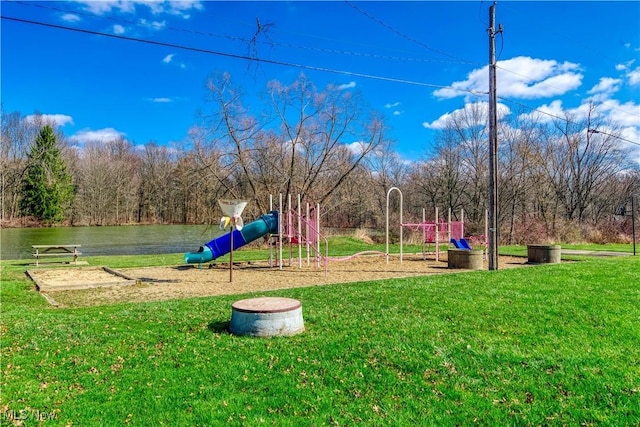 view of play area featuring a lawn