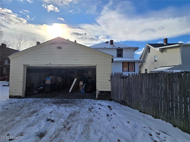 view of snow covered garage