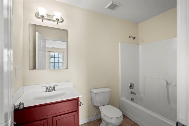 full bathroom with vanity, toilet, tile patterned flooring, and shower / bathing tub combination