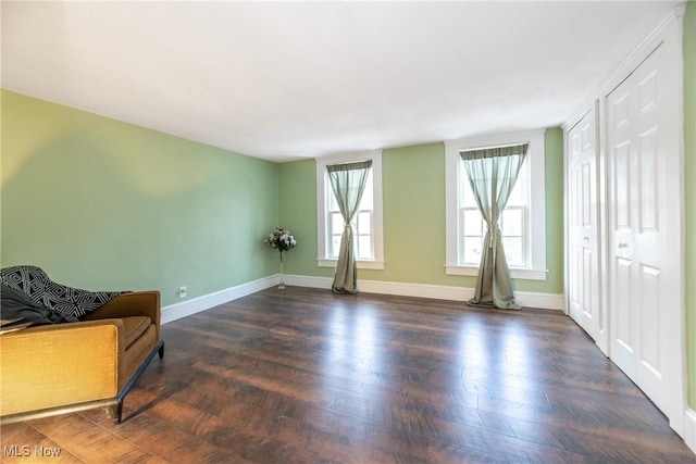 living area with dark wood-type flooring