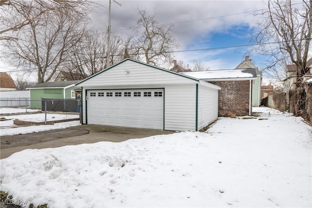 view of snow covered garage