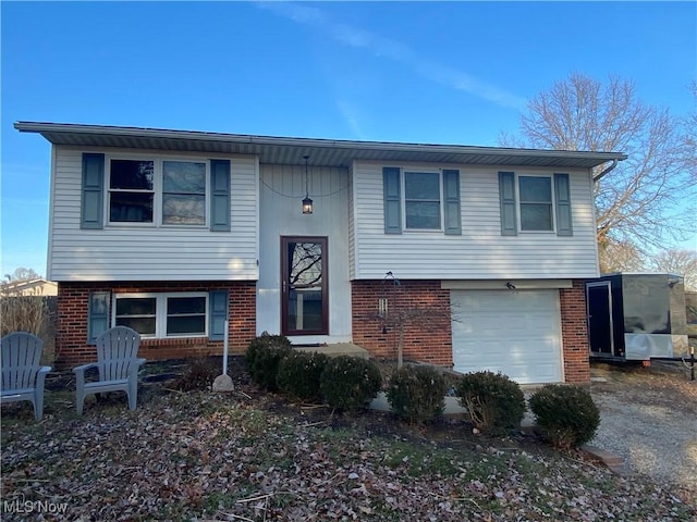 split foyer home featuring a garage