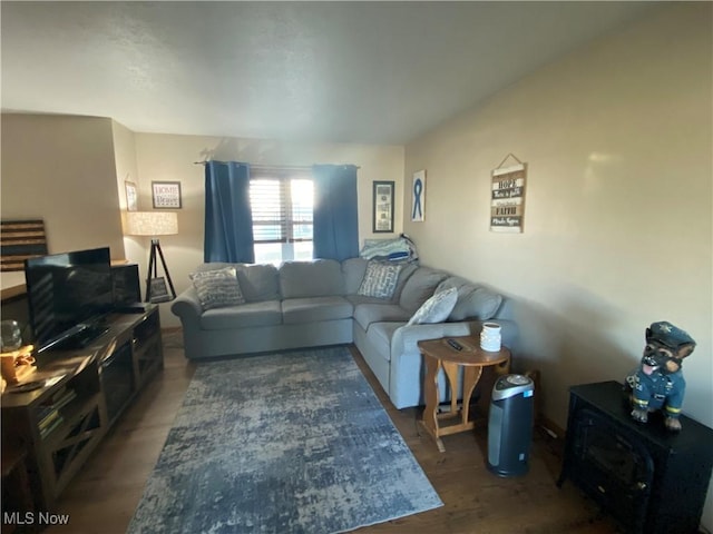 living room featuring dark hardwood / wood-style floors