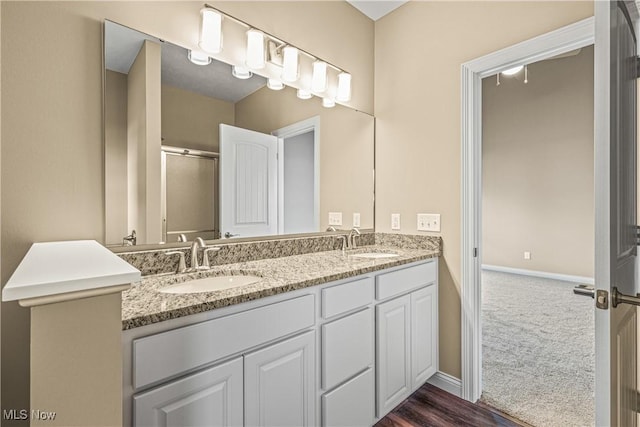 bathroom featuring vanity and walk in shower