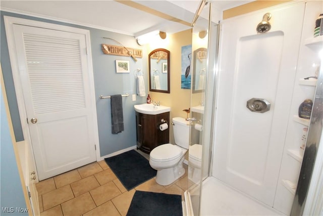 bathroom with vanity, tile patterned floors, toilet, and walk in shower