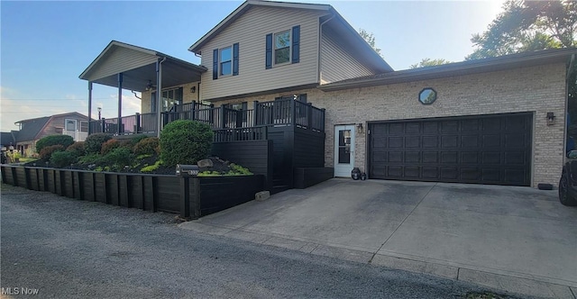 view of side of property with a garage