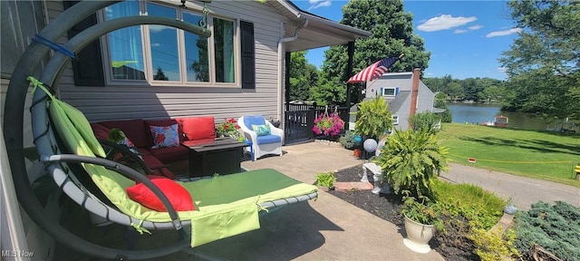 view of patio / terrace with a water view