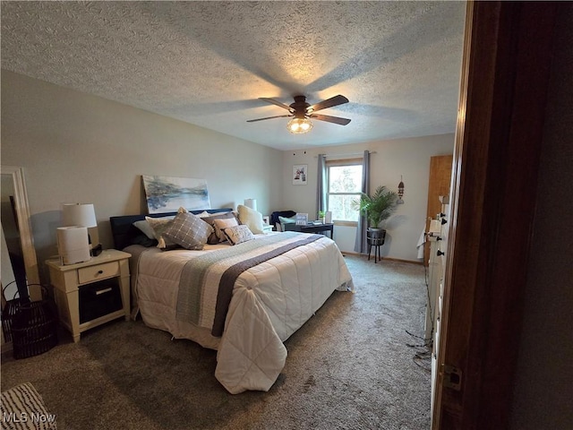 bedroom featuring ceiling fan, carpet floors, and a textured ceiling