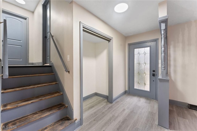 foyer with light hardwood / wood-style floors