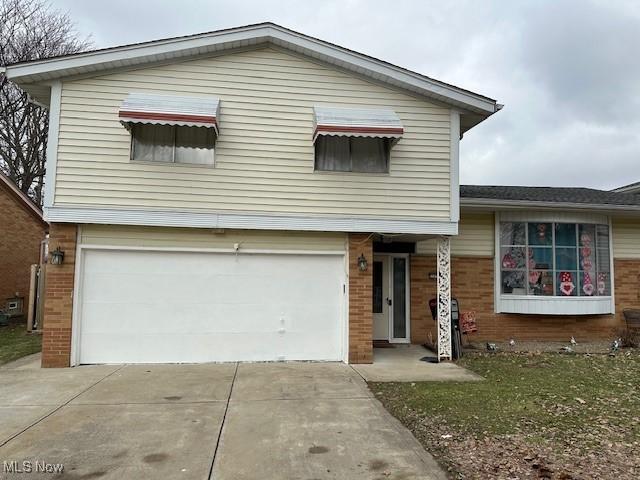 split level home with a garage