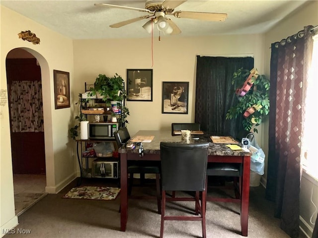 dining room with ceiling fan