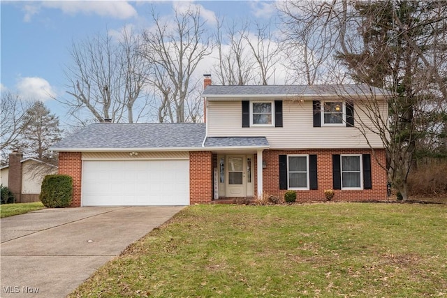 view of front property with a garage and a front lawn