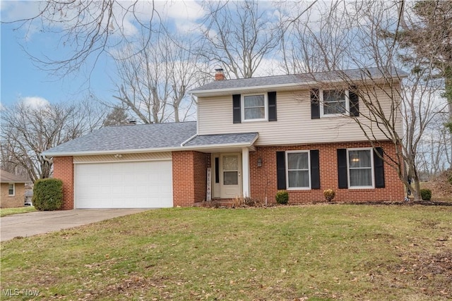 view of front property with a garage and a front lawn