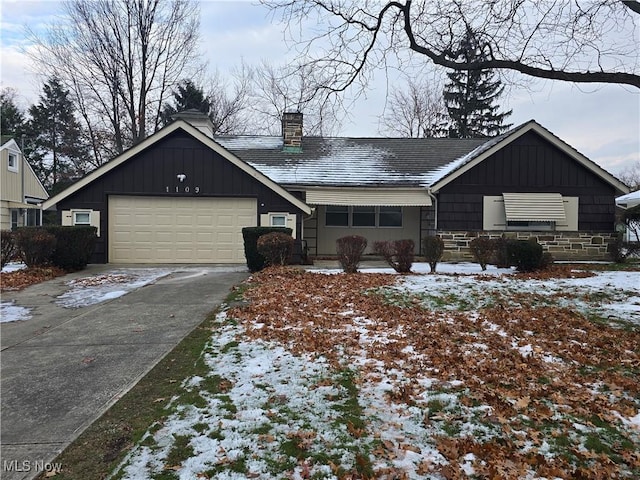 view of front of property with a garage