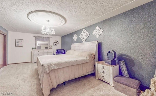 carpeted bedroom featuring a textured ceiling and a chandelier